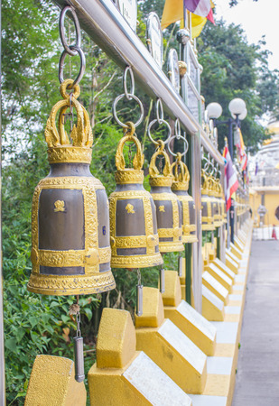 row of bell in Buddhist  temple of Thailandの写真素材