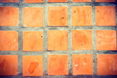 orange tile floor backgroundの写真素材