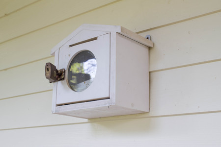 white wood mail box with key lockedの写真素材