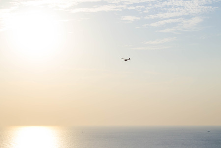 private plane on blue sky at sunset time