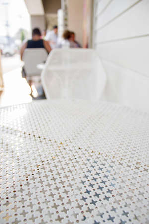 white metal table in the restaurantの写真素材