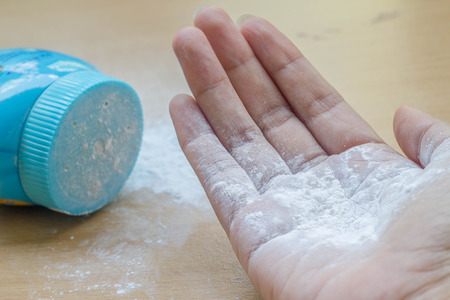 white talcum powder on the wood floorの写真素材