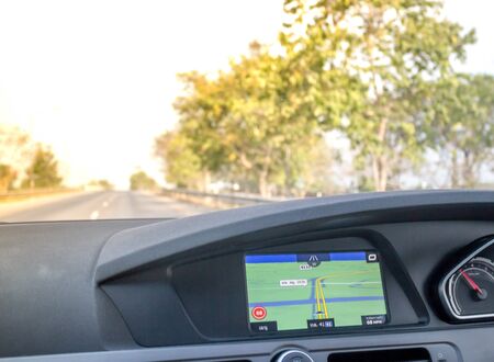 GPS navigation screen in car driving on the road