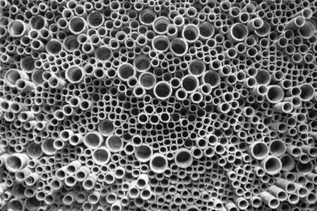 abstract photo of tacked concrete pipes background