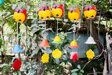 hanging platers with an owl doll