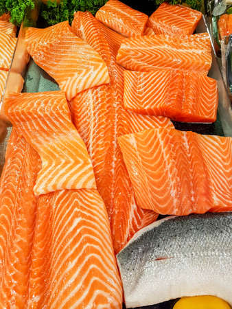 fresh salmon meat  displayed on ice in the super market