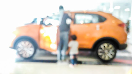 blurred man open car with his son : for background useの写真素材