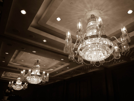elegant chandelier on the ceiling in retro filterの写真素材