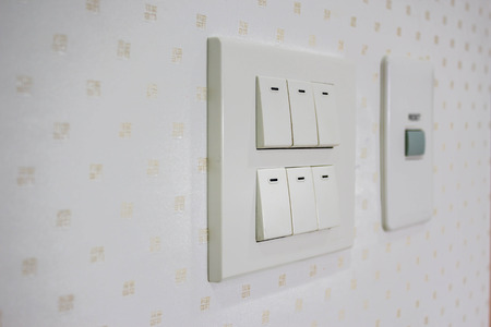 close up of lighting switch on the wall