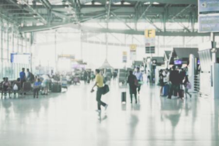 blurred people walking at the airport or business hall : for background useの写真素材