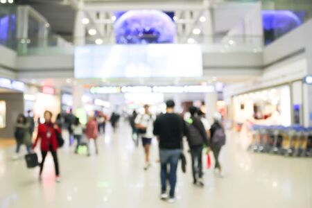 blurred people walking at the airport or business hall : for background useの写真素材