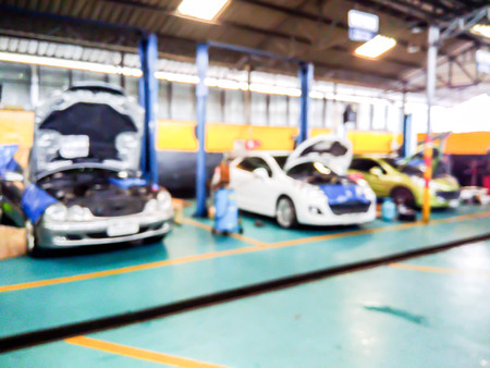 blur of car repair in service stationの写真素材