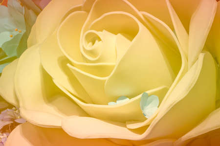 close up of yellow artificial rose