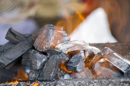 charcoal BBQ blazing and growing in tray
