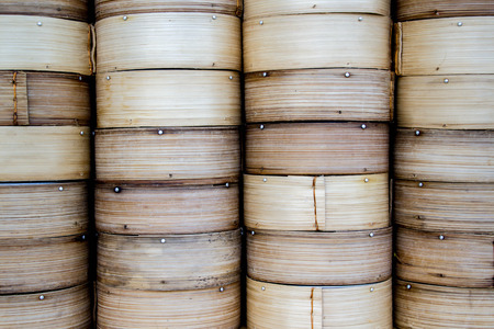 background a pile of bamboo steamer for Dim Sum : traditional Chinese foodの写真素材