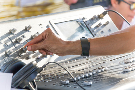 close up of hand on sound check