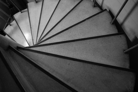circle spiral staircase in black and whiteの写真素材