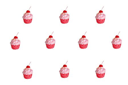 pattern of cupcakes in red cup with buttercream and red cherry on top  on whitebackgroundの写真素材