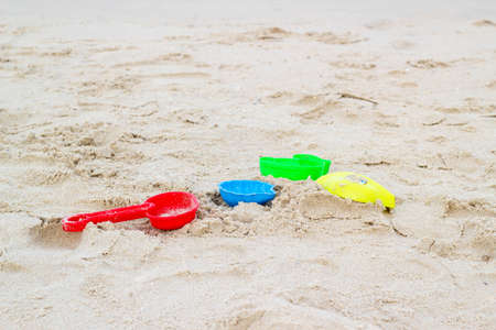 colorful sand scoop on the sand