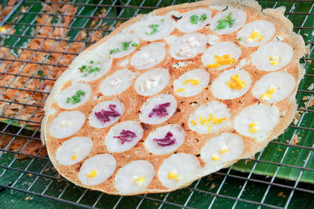 Kanom Krok : Thai sweetmeat, Thai traditional dessert. made from coconut milk mix with powder fried dessert.の写真素材