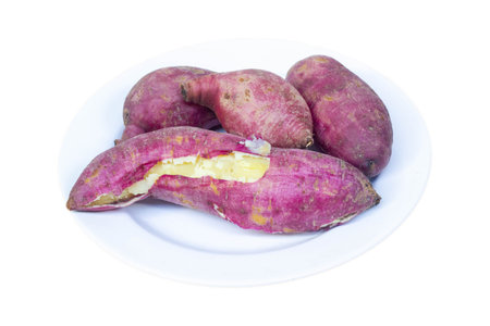 steamed Japanese sweet potatoes in white plated isolated on white backgroundの写真素材