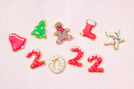royal icing Christmas cookies on white plate