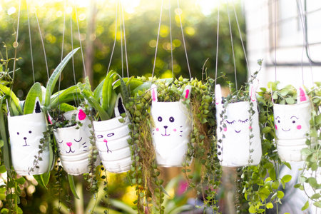 cute plant pots made from reused water bottlesの写真素材