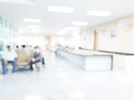 blurred people waiting in hospital or government office: for background useの写真素材