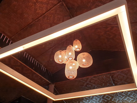 decorative hanging lanterns in wooden rattan made from bamboo.の写真素材