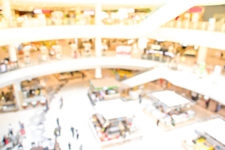 Abstract blurred of department store or shopping center mall : blurred image for background use. Abstract blur shopping mall background.の写真素材
