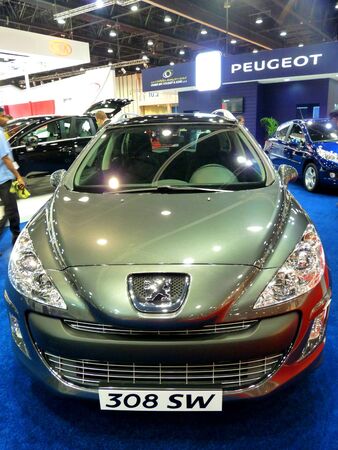 ABU DHABI, UAE - DECEMBER 10:Peugeot 308 SW on display during Abu Dhabi Int'l Motor Show 2010 at Abu Dhabi Int'l Exhibition Centre December 10, 2010 in Abu Dhabi,United Arab Emirates.のeditorial素材