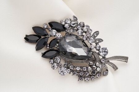 Stylish brooch with diamonds,  isolated on white background. Women Accessories