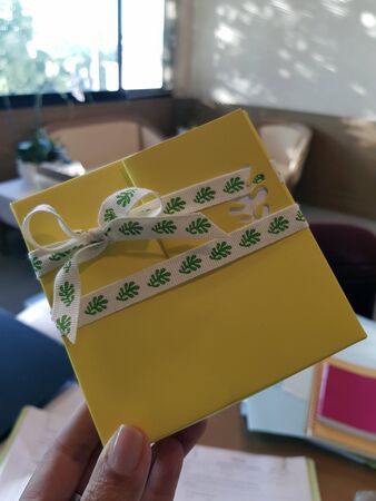 women hand holding giftの写真素材