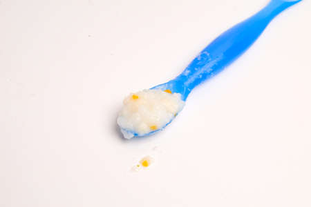 Baby porridge on the spoonの写真素材