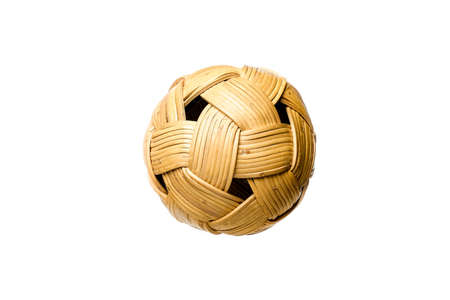 A levitation picture of "takraw" ball on isolated white background. "Takraw" is a sport using rattanÂ ball and only allowing players to use their feet, knee, chest and head to touch the ball.の写真素材