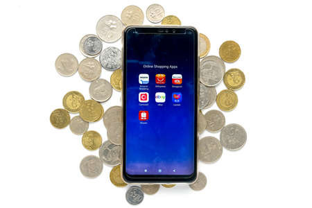 Klang,Malaysia- Circa November, 2020: A flatlay picture of smartphone with variety Online Shopping...