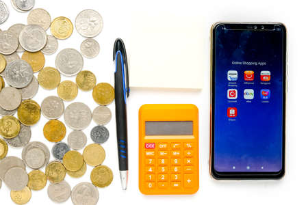 "Klang,Malaysia- Circa November, 2020: Flatlay picture of online or e-shopping platform in smartphone with other prop insight. Online shopping among user during covid-19 record Trillions of dollar."のeditorial素材