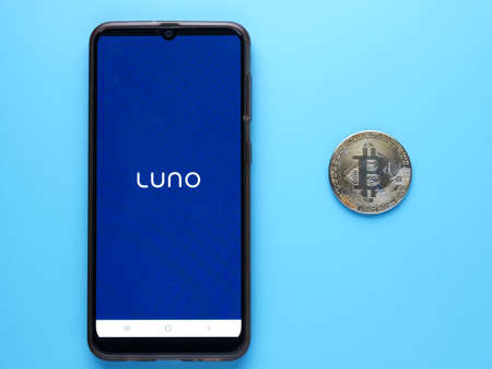 Kuala Lumpur, Malaysia- Circa May, 2021: Famous crypto mobile apps, Luno at smartphone with bitcoins...