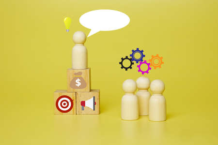 A picture of peg dolls with bulb and chat box together with money bag, target and hailer symbol on...