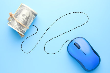 A picture of mouse with fake money and dashed line. Learn to generate income with online business...