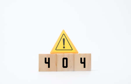A picture of warning sign and wooden block written 404. Error 404 at your page concept.の写真素材