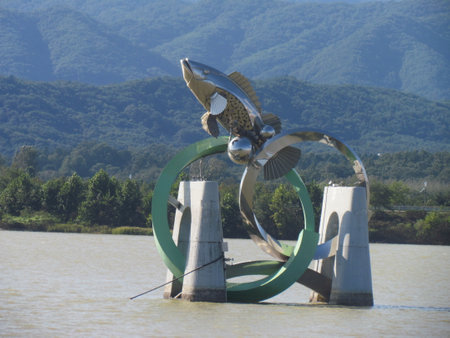 Chuncheon, South Korea- 19th Sep, 2020: The Statue of fish in middle of Soyanggang or soyang river with blue skyのeditorial素材