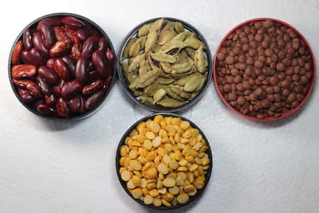 Top view of assortment of cereals, and cardamom. Collection of different spices and cereals.の写真素材