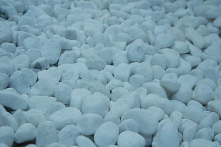Top view of white stones background.の写真素材