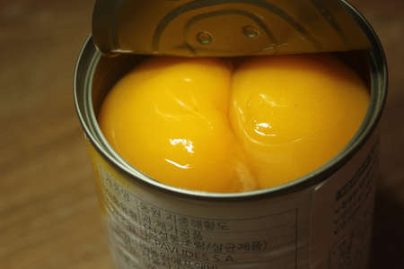 Chuncheon South Korea, October 30-2020: Closeup view with selective focus of yellow peaches slices....
