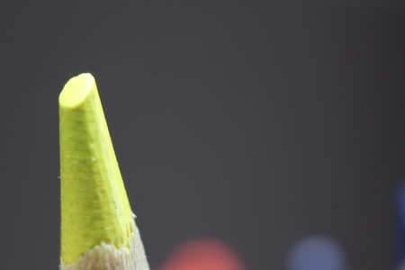 close up of sharpened pencil.Macro view of the tip of the pencil on a black background.の写真素材