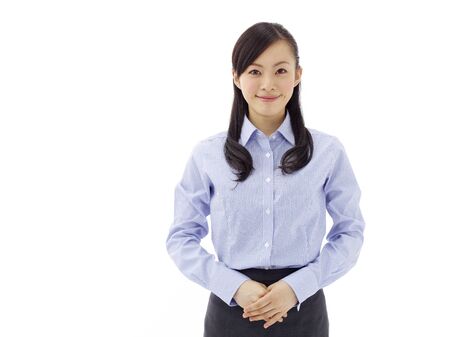 business woman smiling - isolated over a white backgroundの写真素材