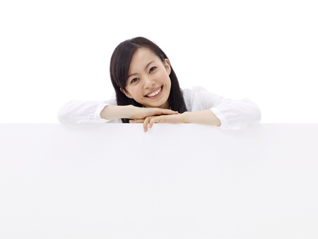 woman holding a blank billboard.の写真素材