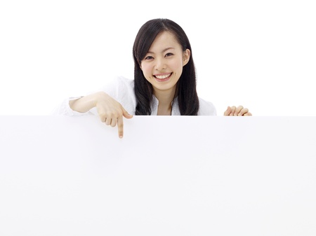 woman holding a blank billboard.の写真素材