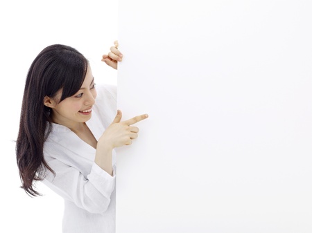 woman holding a blank billboard.の写真素材